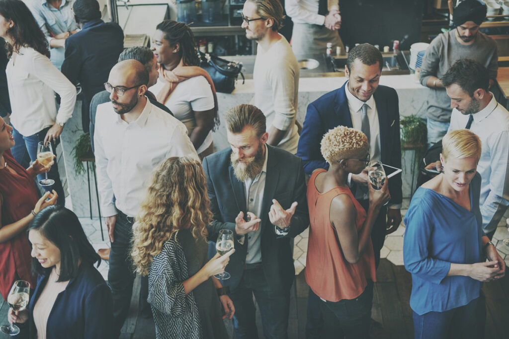 Business professionals networking at reception