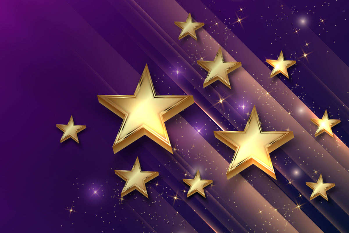 Gold stars on a purple background