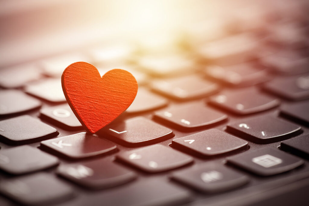 Red heart on computer keyboard