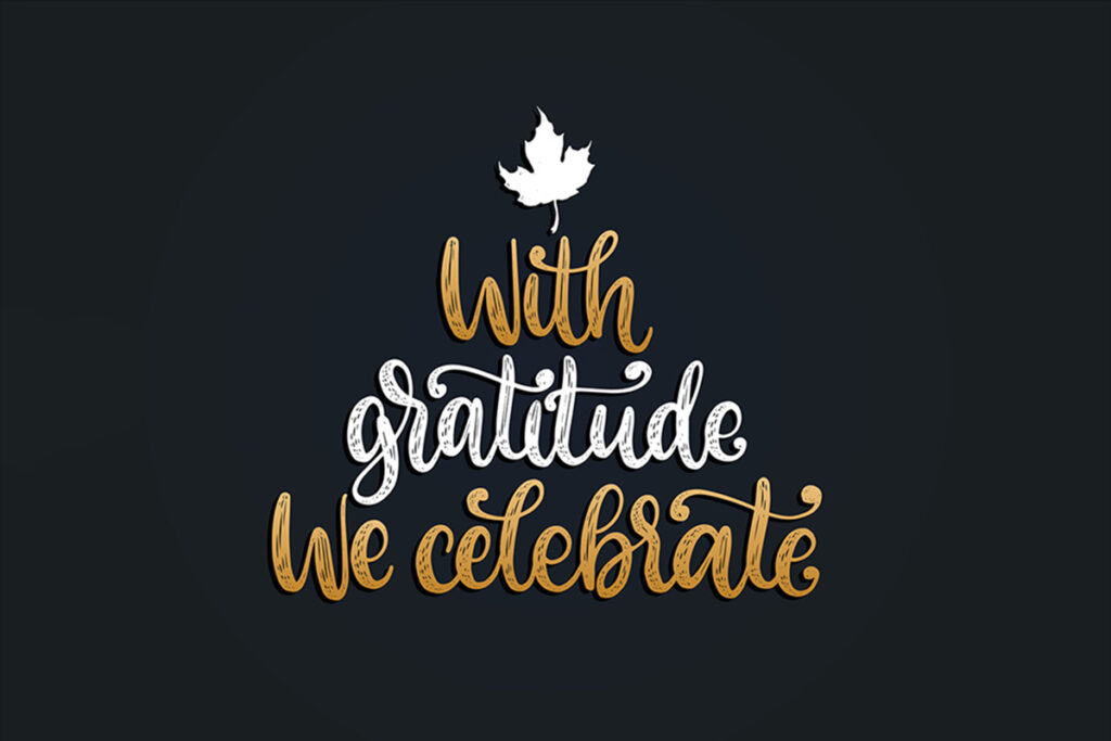 Dark background with hand-lettered text forming a tree shape that reads ‘With gratitude we celebrate,’ featuring a white leaf at the top — a visual reminder to celebrate wins during the holiday season.