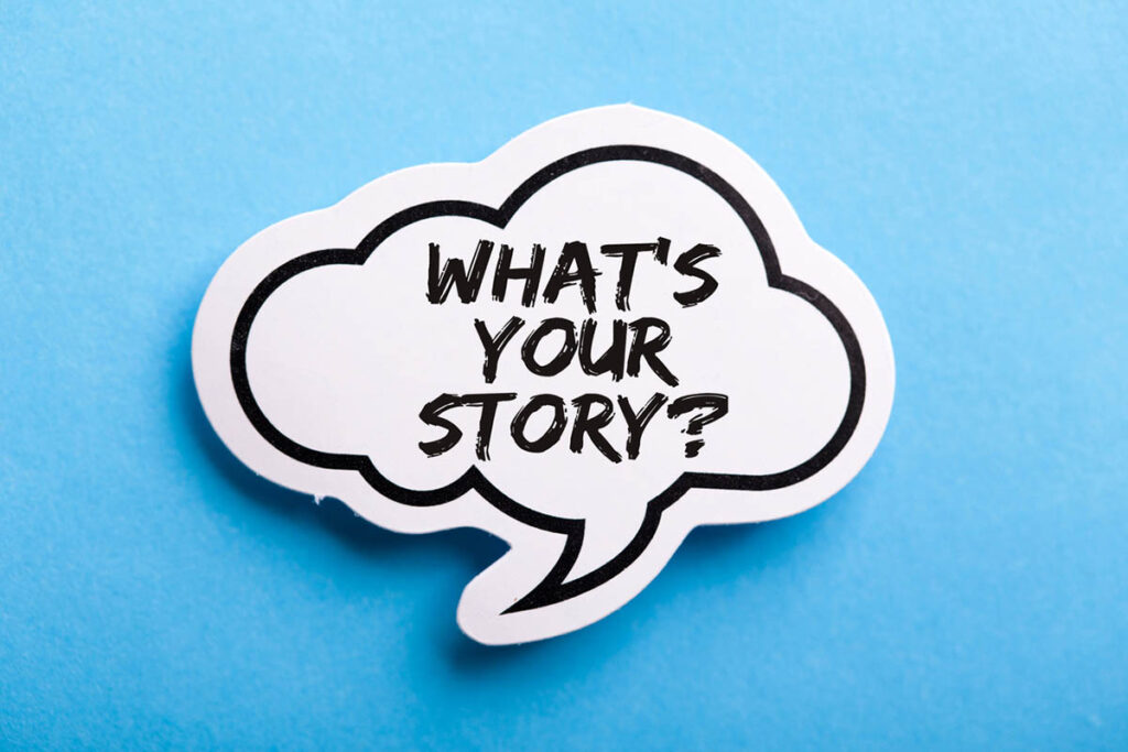 Speech bubble on a blue background with the words “What’s your story?” representing reflection on your brand story and how it shapes your business decisions.