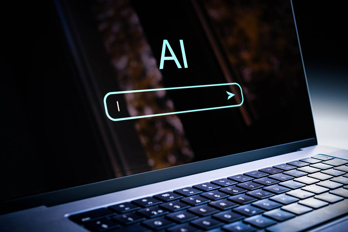 A professional uses AI-powered search to evaluate options and analyze information, illustrating how AI in B2B buying is influencing vendor selection, buyer research, and decision-making.